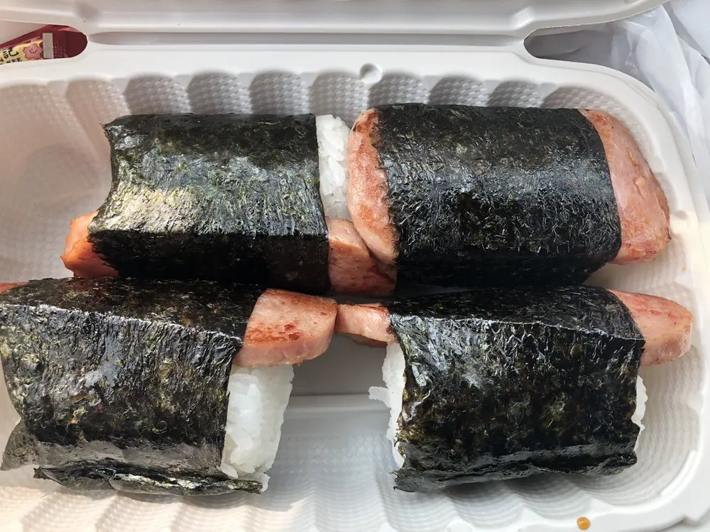 Four pieces of grilled spam musubi in a container at Yummy Hawaiian BBQ, a Hawaiian Restaurant in Antioch