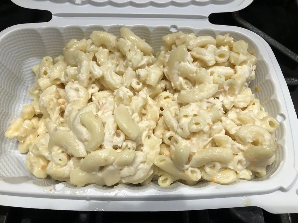 Creamy macaroni salad inside a takeout container at Yummy Hawaiian BBQ, a Hawaiian Restaurant in Antioch